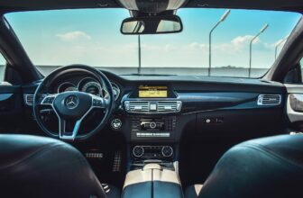 A cozy car interior with comfortable seating and travel essentials for long journeys.